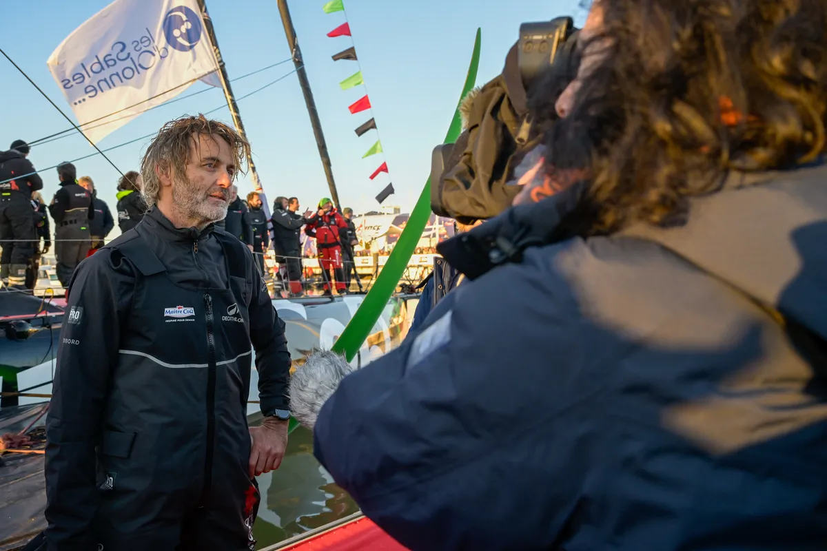 LES SABLES D’OLONNE, FRANCE - FEBRUARY 02, 2025 : Maître CoQ V skipper Yannick Bestaven (FRA) is being interviewed by media arriving in Les Sables d'Olonne after retiring from the Vendee Globe, on February 02, 2025 - (Photo by Olivier Blanchet / Alea)