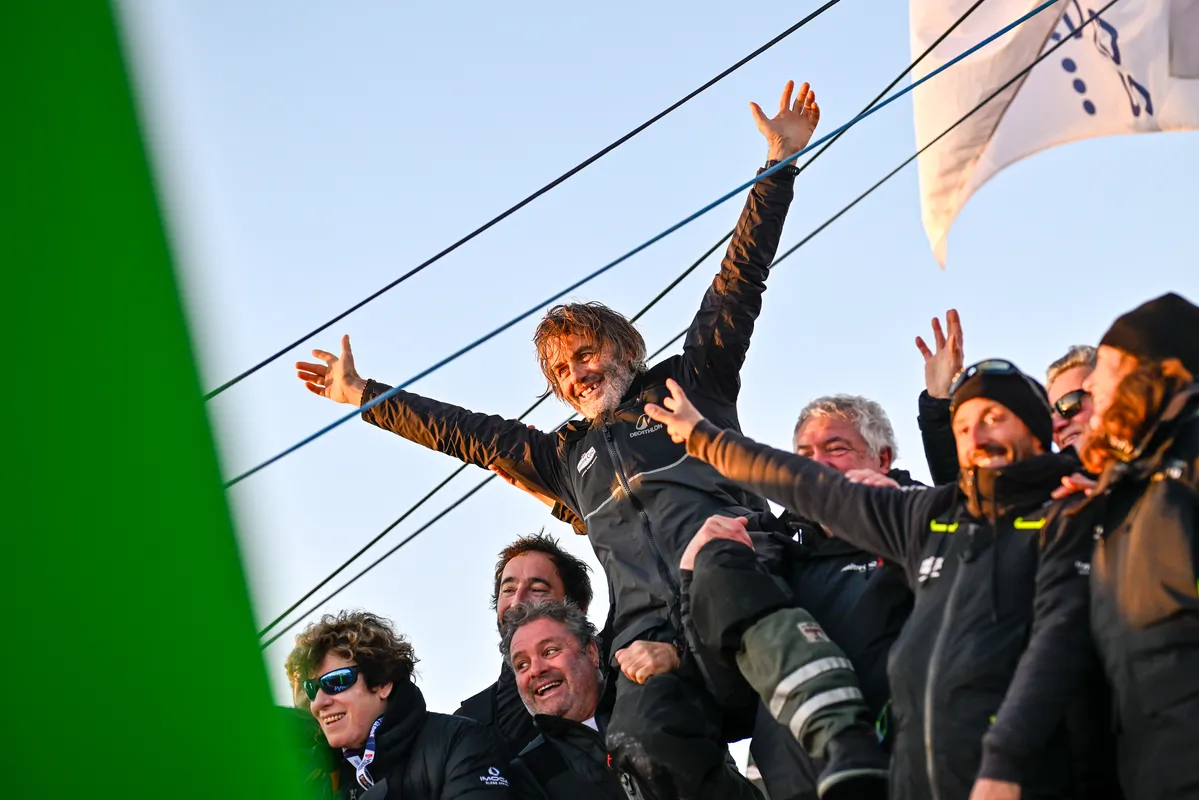 LES SABLES D’OLONNE, FRANCE - FEBRUARY 02, 2025 : Maître CoQ V skipper Yannick Bestaven (FRA) is photographed with his team at pontoon, arriving in Les Sables d'Olonne after retiring from the Vendee Globe, on February 02, 2025 - (Photo by Jean-Louis Carli / Alea)