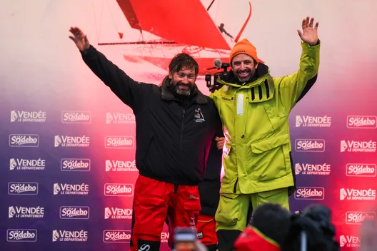 LES SABLES D'OLONNE, FRANCE - 09 FEVRIER 2025 : Louis Duc (FRA), skipper de Fives Group - Lantana Environnement, et Sébastien Marsset (FRA), skipper de FOUSSIER, sont félicités par le public après avoir pris les 26ème et 27ème places du Vendée Globe, le 09 février 2025 aux Sables d'Olonne, France - (Photo by Jean-Marie Liot / Alea)