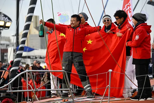 LES SABLES D'OLONNE, FRANCE - 18 FEVRIER 2025 : Le skipper de Singchain Team Haikou, Jingkun Xu (CN), fête sa 30ème place dans le Vendée Globe, le 18 février 2025 aux Sables d'Olonne, France - (Photo by Jean-Louis Carli / Alea)