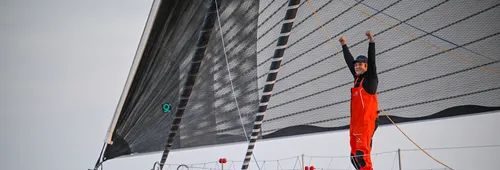 LES SABLES D’OLONNE, FRANCE - FEBRUARY 17, 2025 : Tut Gut. Sailing skipper Oliver Heer (SUI) is celebrating taking 29th place in the Vendee Globe under a very calm weather, on February 17, 2025 in Les Sables d'Olonne, France - (Photo by Jean-Louis Carli / Alea)